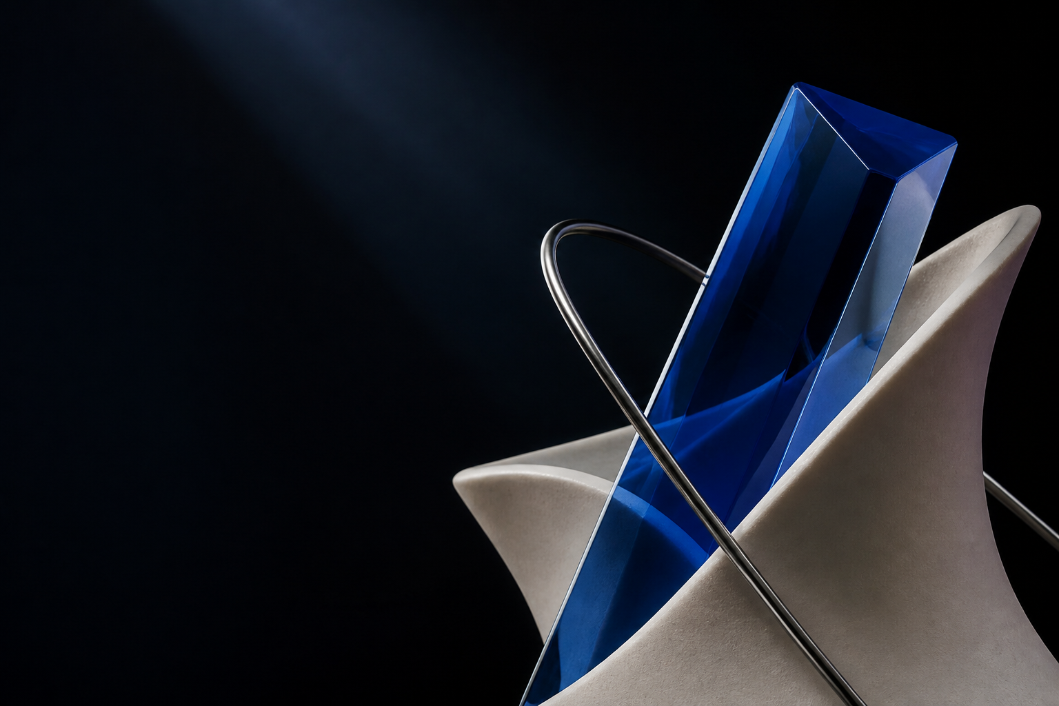 Blue glass geometry held in a pale sculptural form